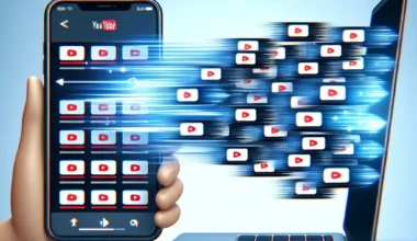 A hand holding a smartphone displaying YouTube icons transferring to a laptop with similar icons.