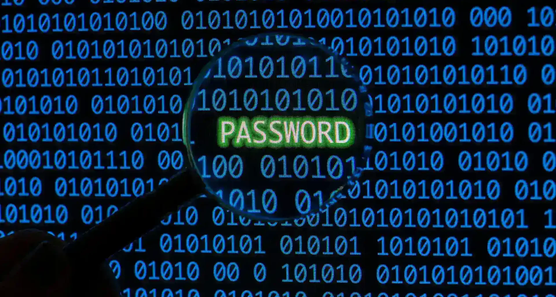 Magnifying glass highlighting the word 'PASSWORD' among binary code on a digital background.